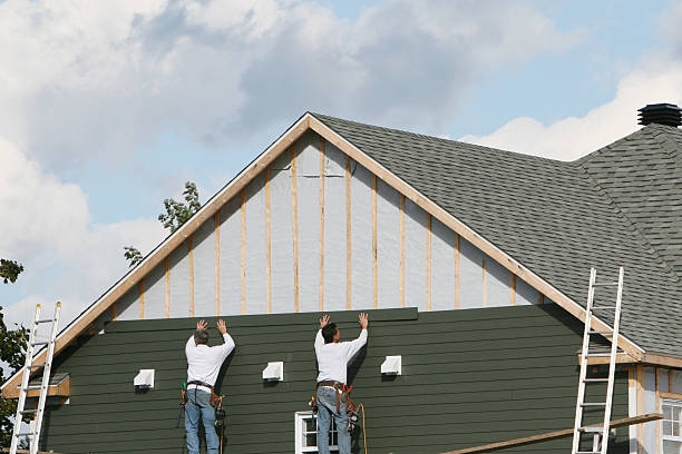 Professional Siding Repair technician working in Greenbush, VA